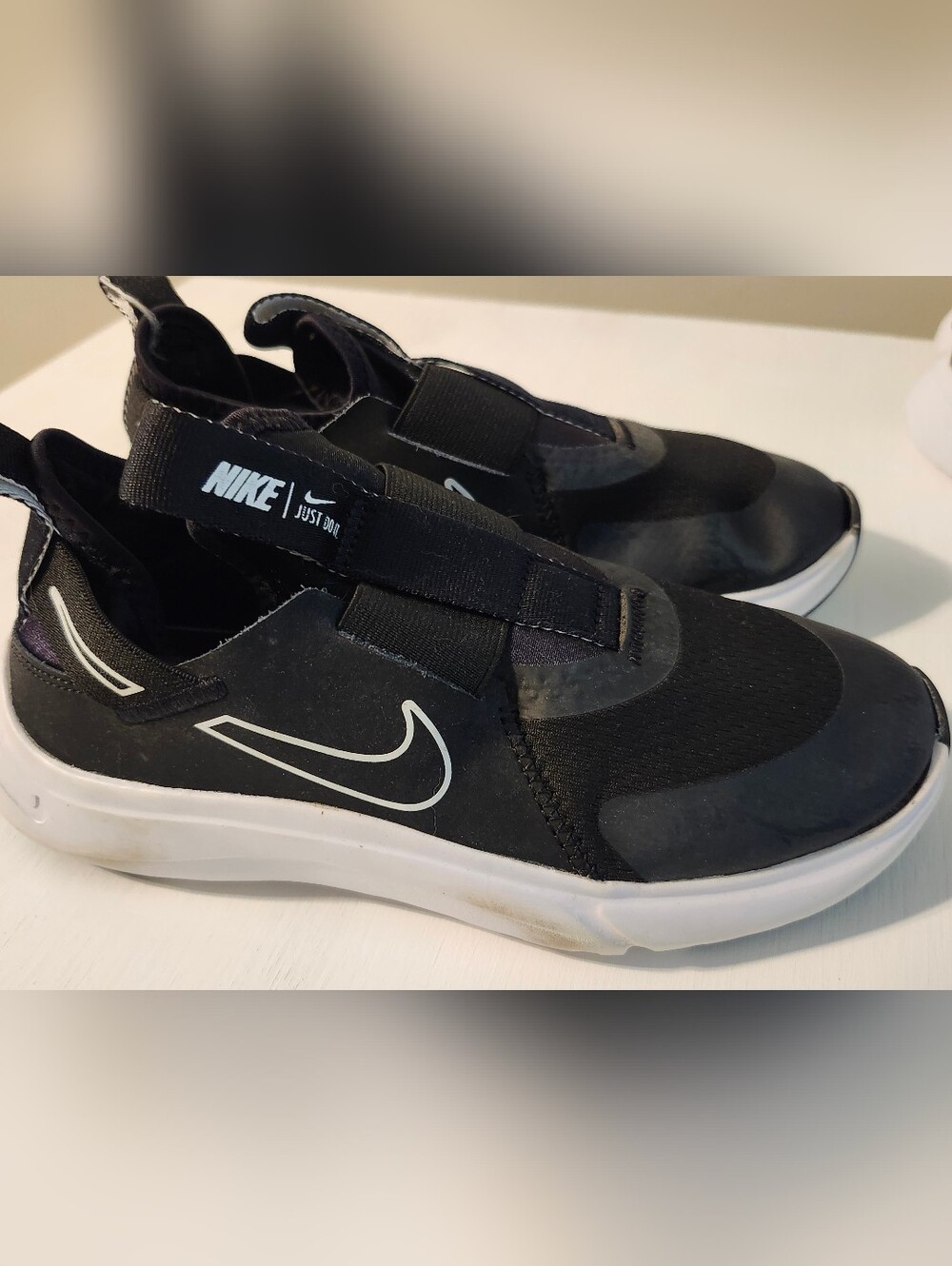 Nike Black Slip-On Sneakers with White Swoosh 3Y
